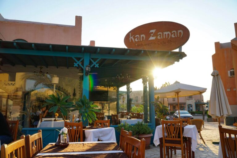a restaurant with tables and chairs